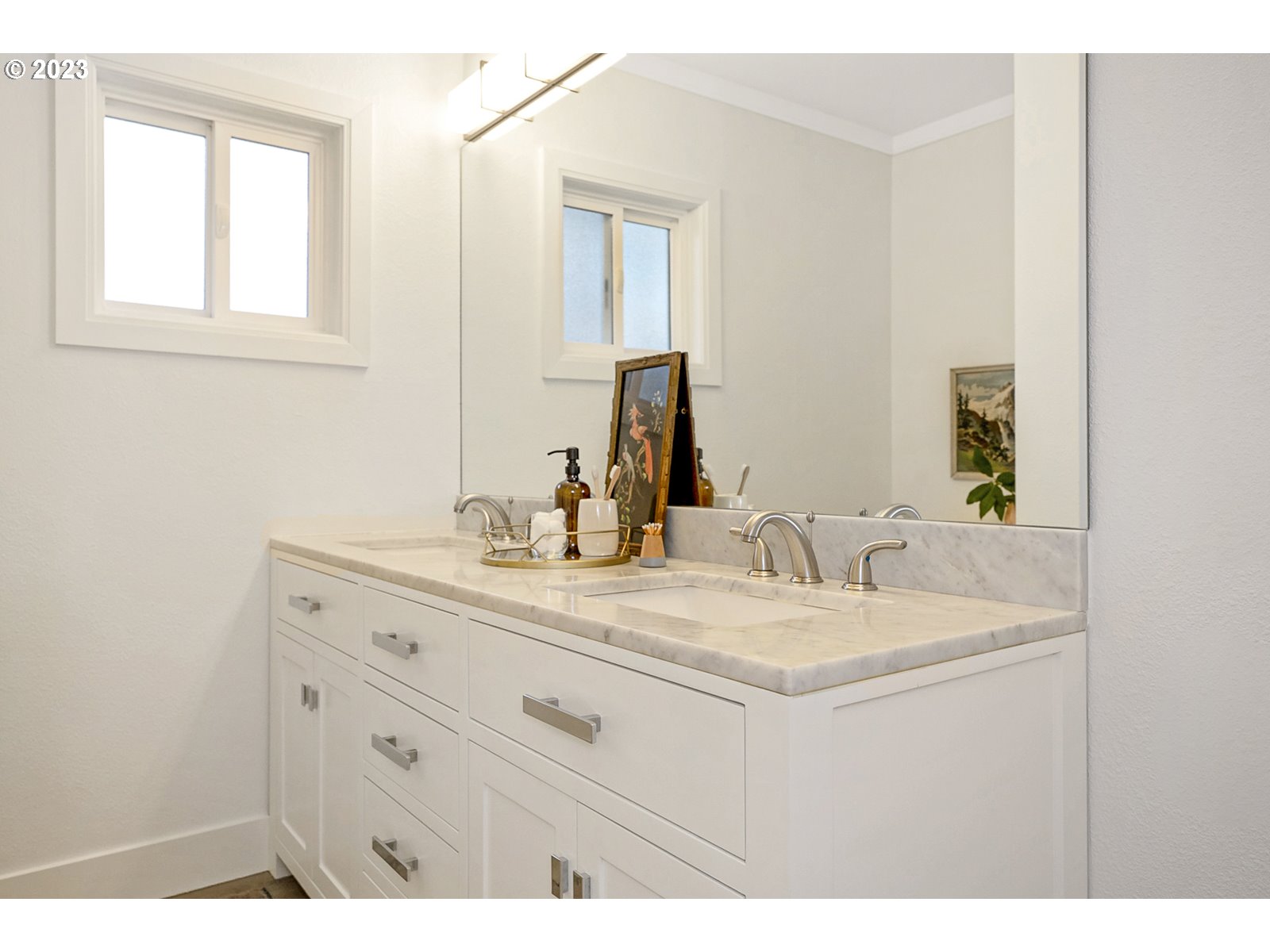 8900 Southwest 69th Avenue Portland, OR 97223 - Photo 20 of 31 a bathroom with a sink vanity and mirror