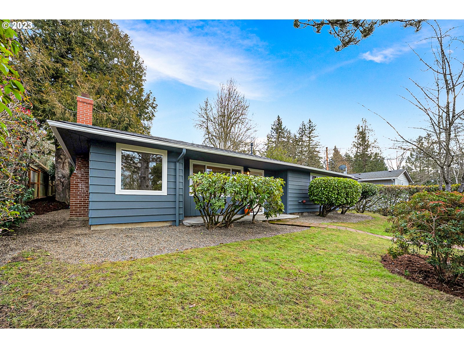 8900 Southwest 69th Avenue Portland, OR 97223 - Photo 24 of 31 a view of a house with a yard