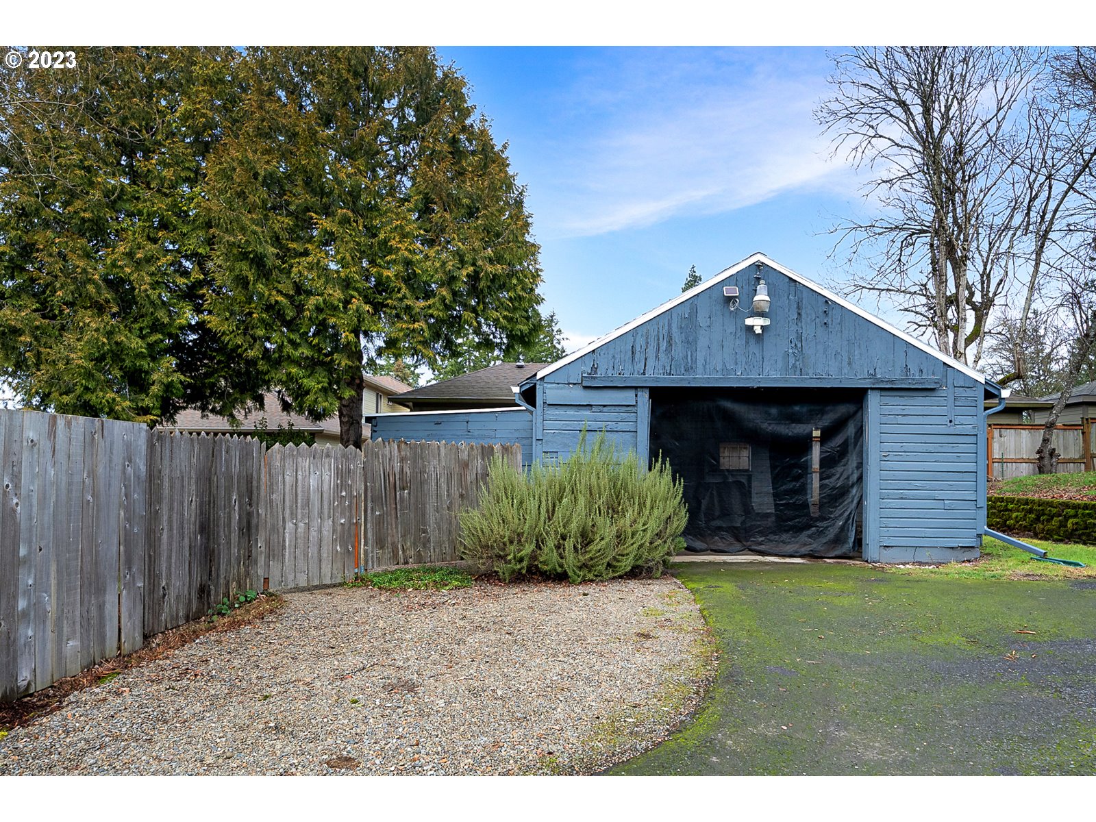8900 Southwest 69th Avenue Portland, OR 97223 - Photo 29 of 31 a front view of a house with a yard