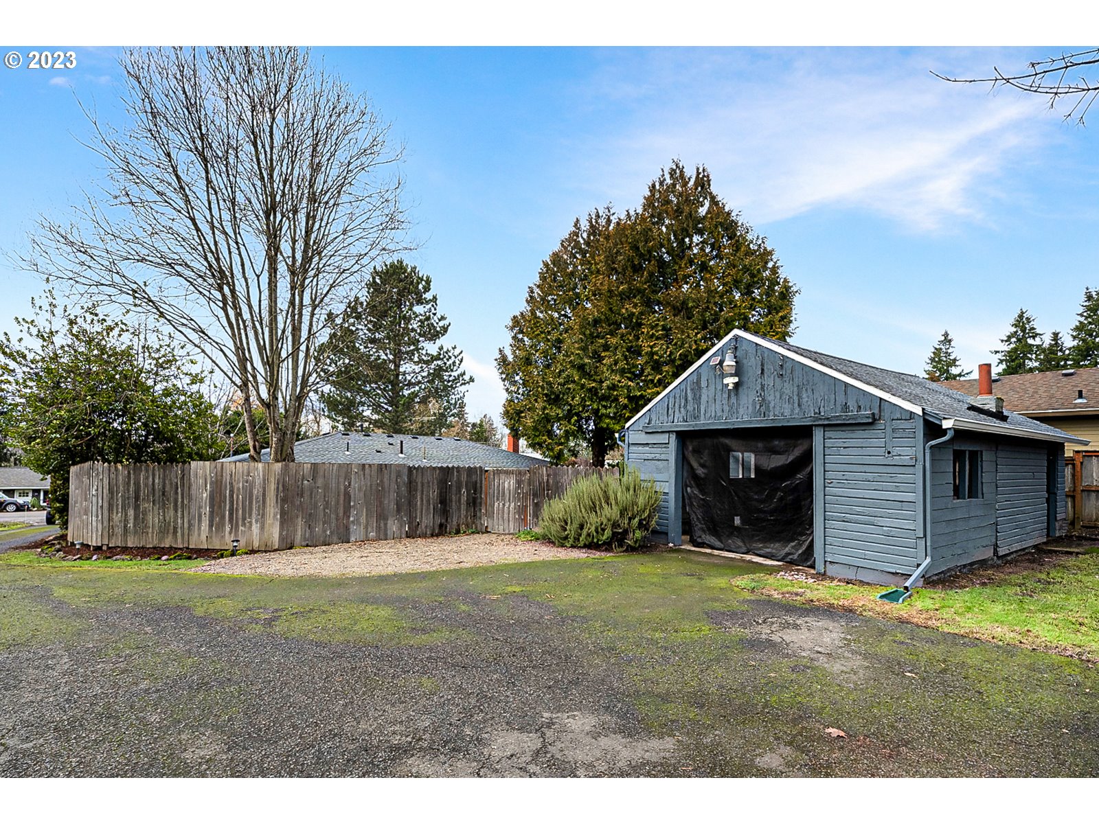 8900 Southwest 69th Avenue Portland, OR 97223 - Photo 30 of 31 a view of a house with a yard
