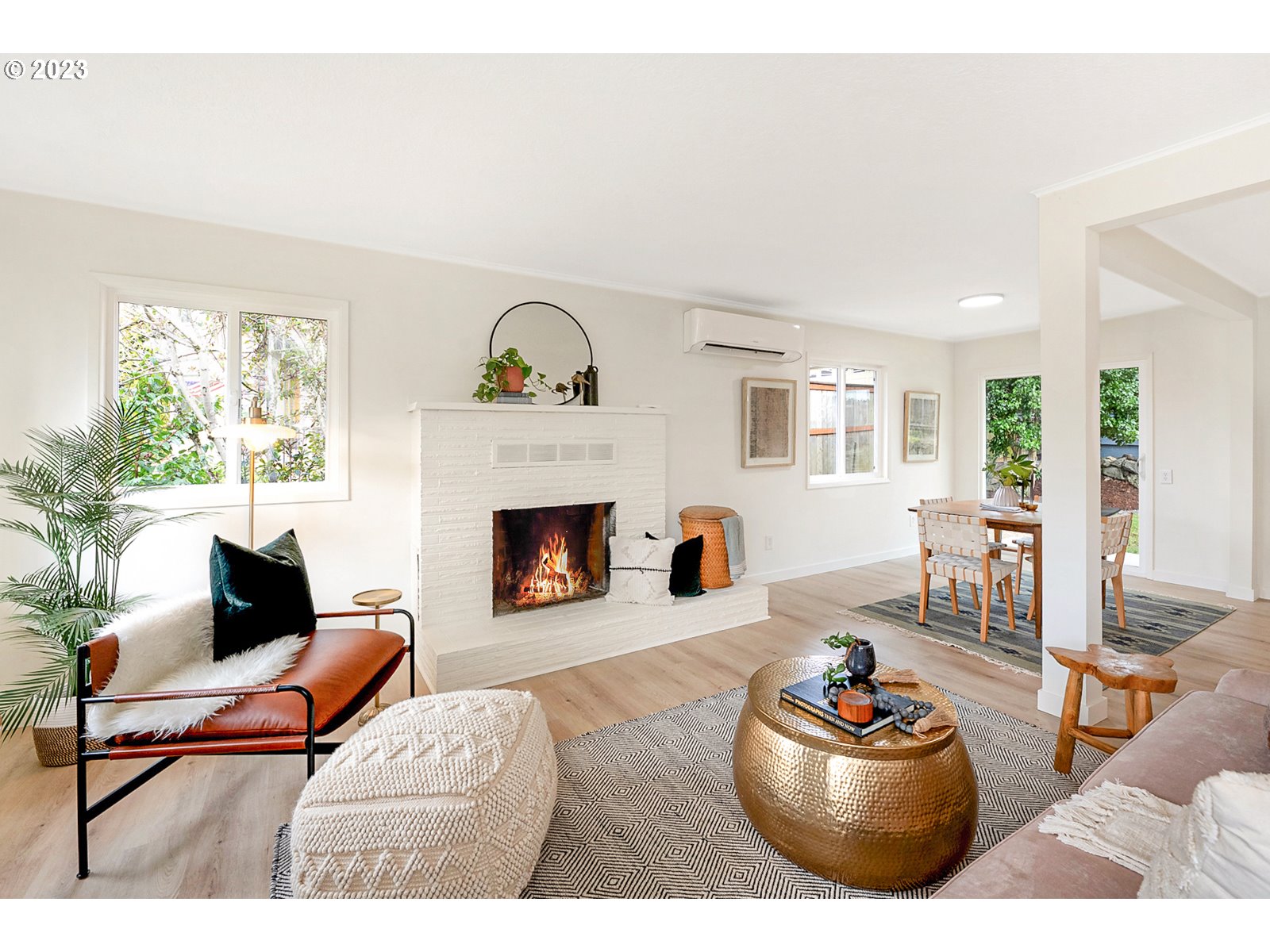 8900 Southwest 69th Avenue Portland, OR 97223 - Photo 3 of 31 a living room with furniture and a fireplace