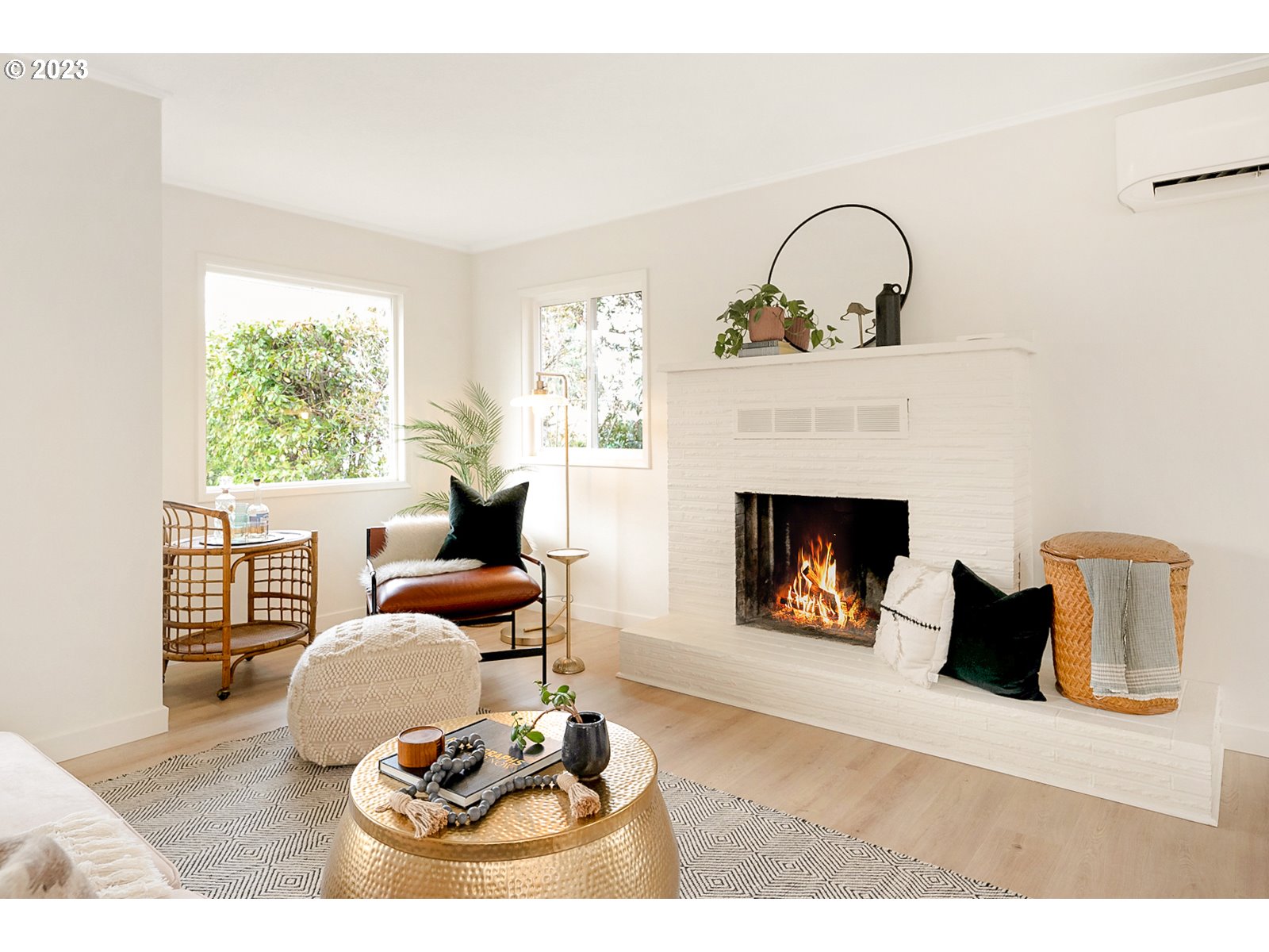 8900 Southwest 69th Avenue Portland, OR 97223 - Photo 5 of 31 a living room with furniture a fireplace and a window