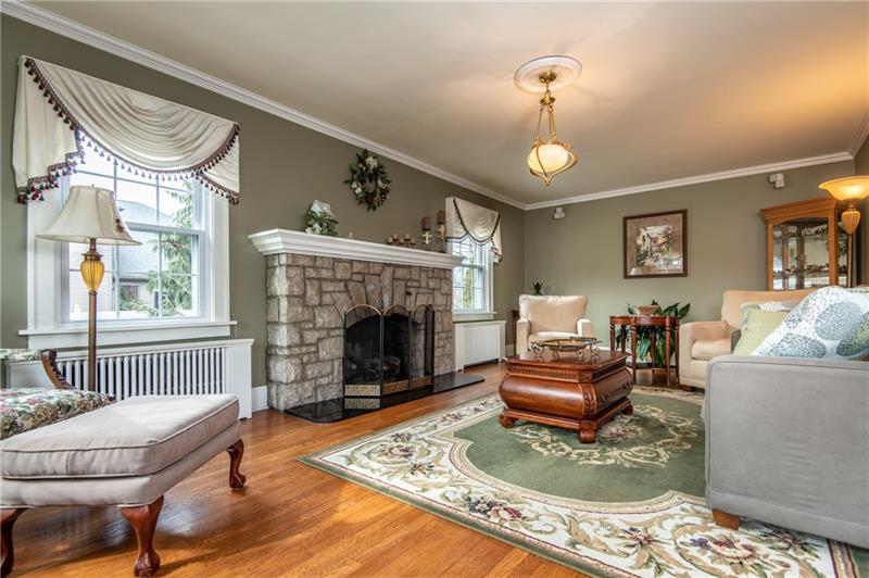 1265 Highland Road Sharon, PA 16146 - Photo 4 of 25 Formal Living Room with fireplace and beautiful hardwood floors.