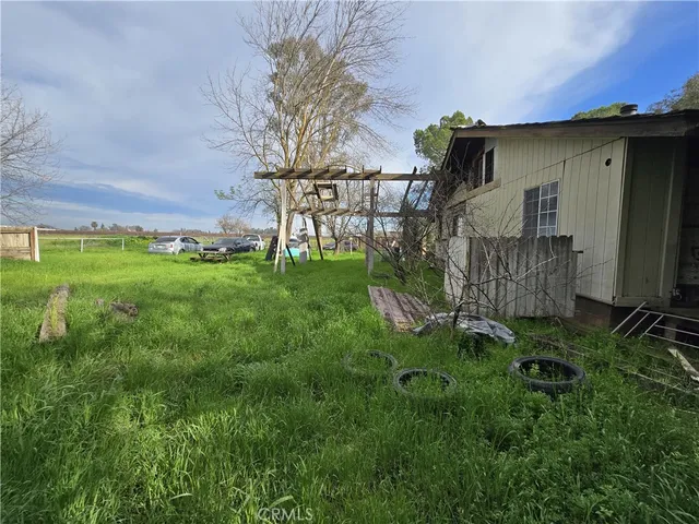 a view of outdoor kitchen with seating space