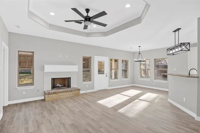 a living room with furniture fireplace and flat screen tv