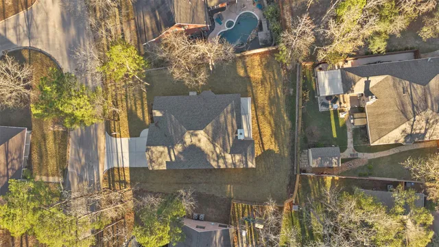 a view of swimming pool with sitting area