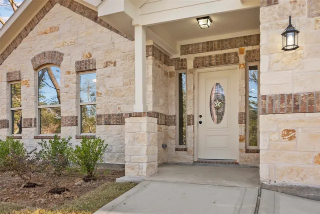a front view of a house with a shower