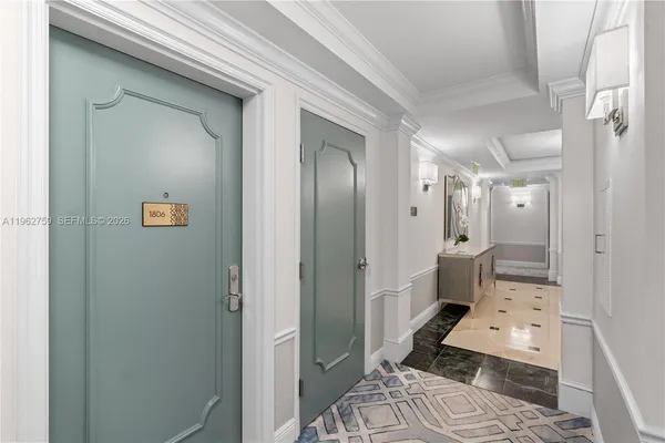 a bathroom with a double vanity sink toilet and shower