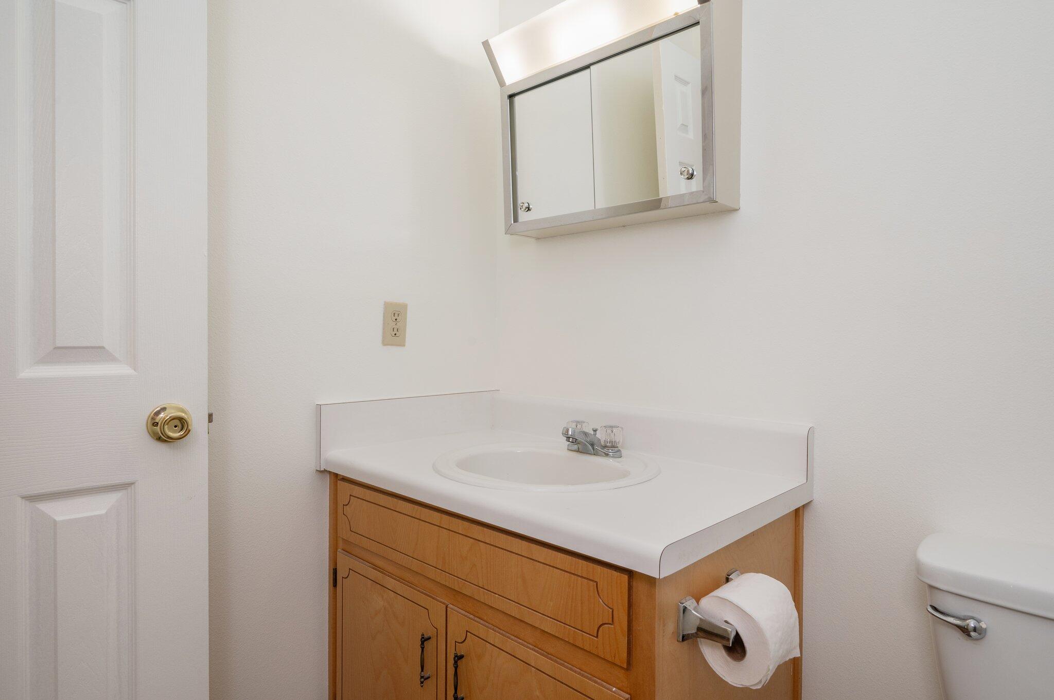624 Hill Street DeFuniak Springs, FL 32435 - Photo 20 of 34 a bathroom with a sink and a mirror