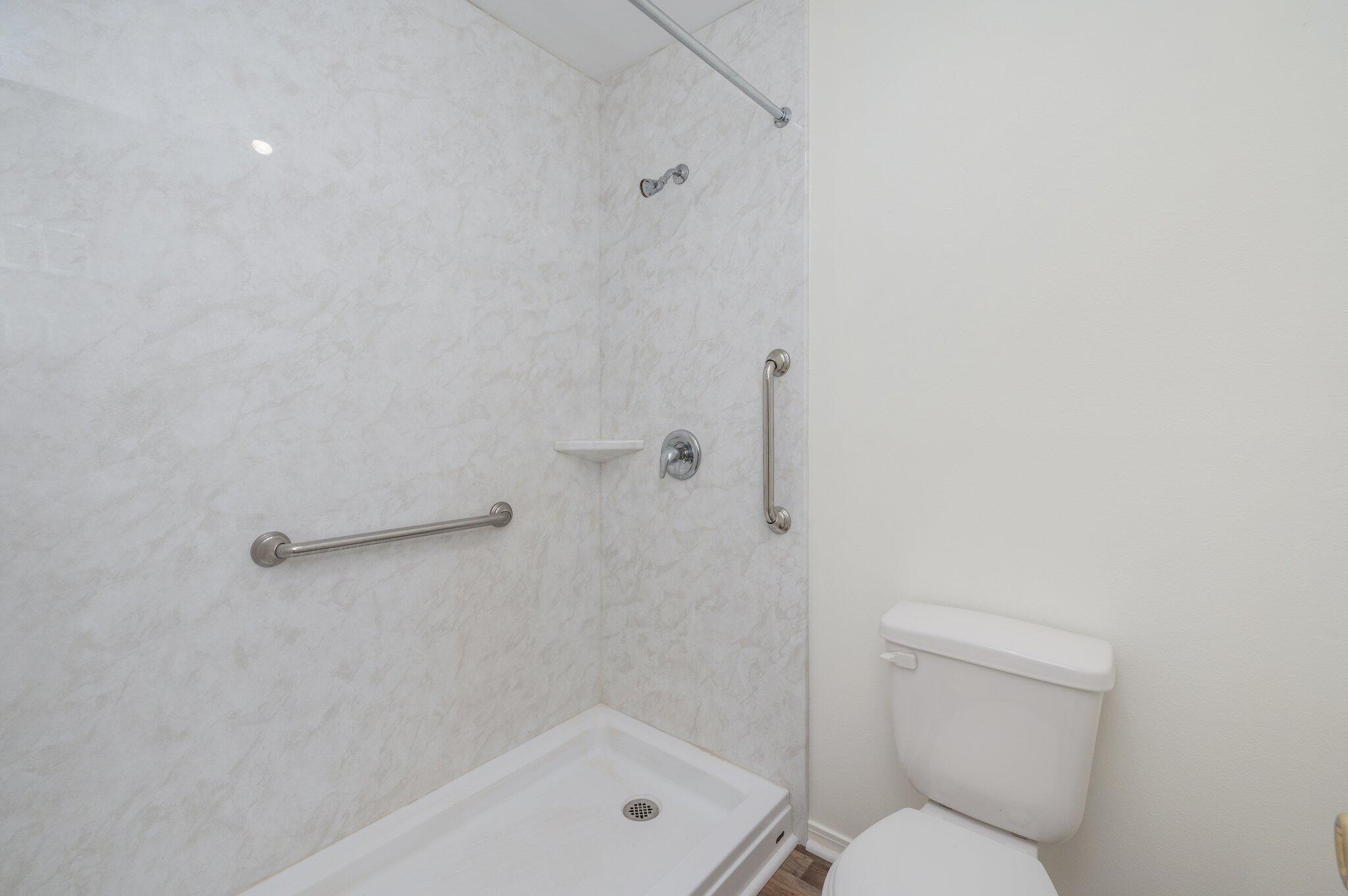 624 Hill Street DeFuniak Springs, FL 32435 - Photo 27 of 34 a bathroom with a toilet and a shower