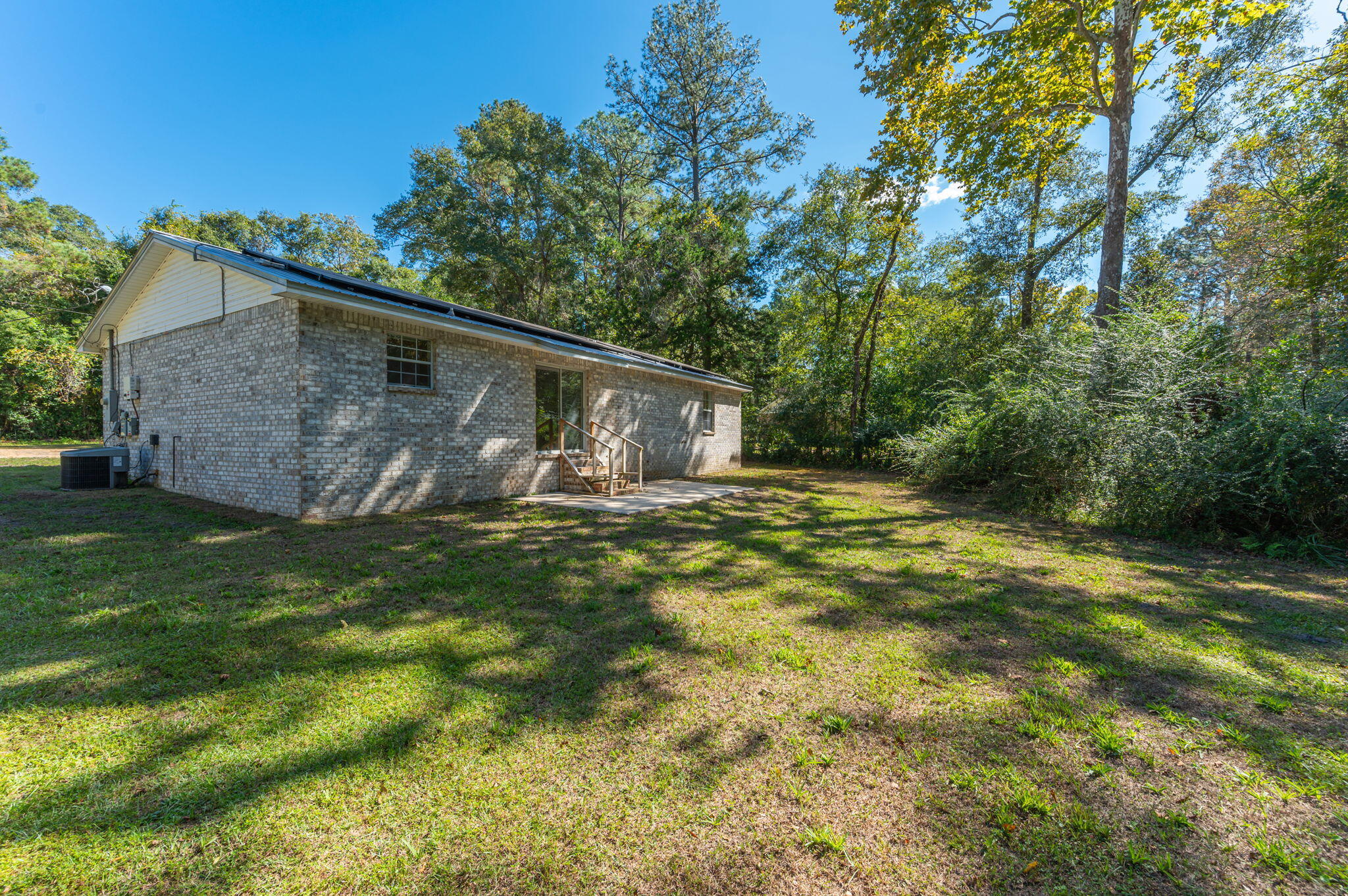 624 Hill Street DeFuniak Springs, FL 32435 - Photo 30 of 34 a view of a house with a yard