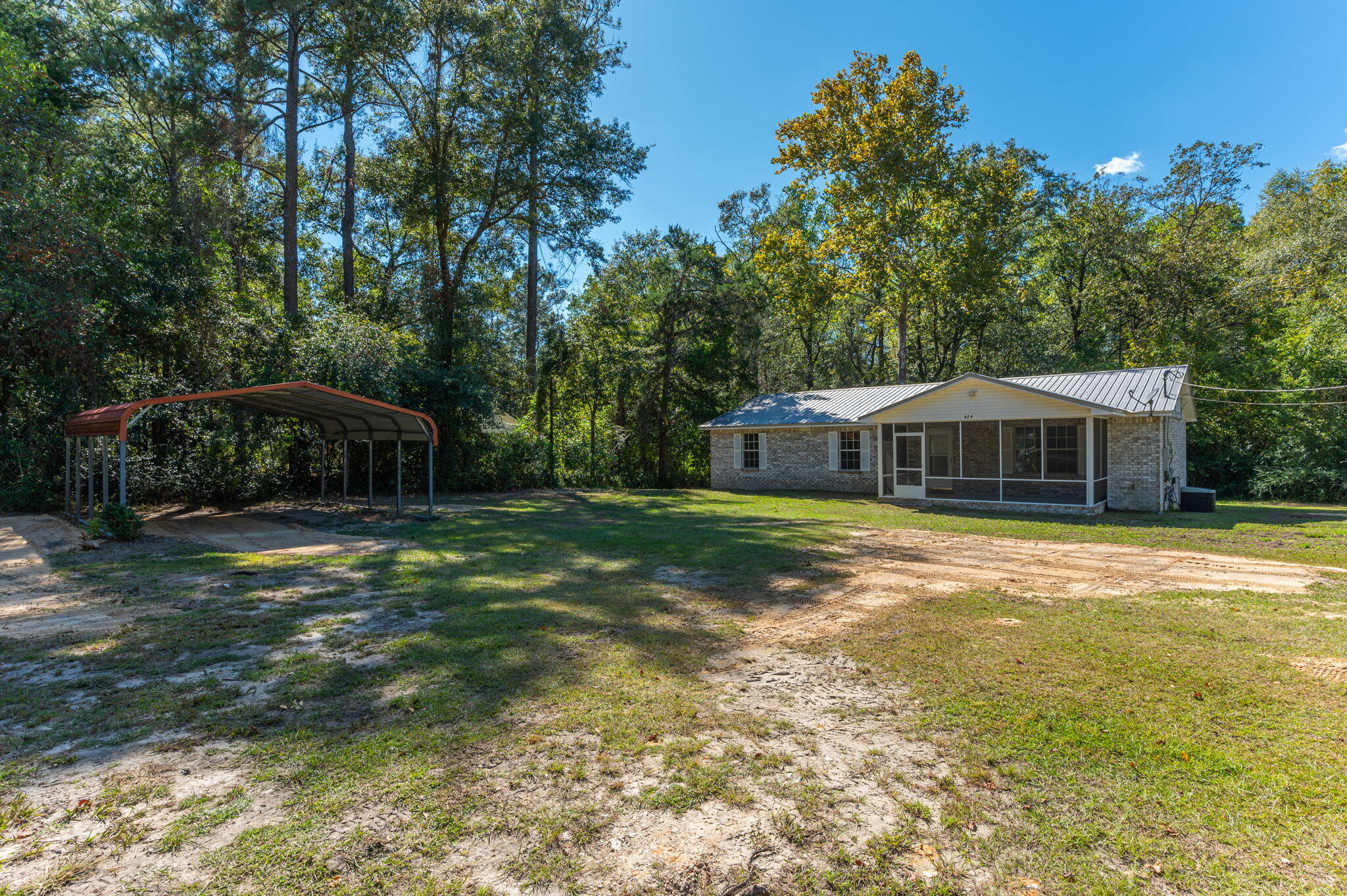 624 Hill Street DeFuniak Springs, FL 32435 - Photo 33 of 34 a front view of a house with a yard
