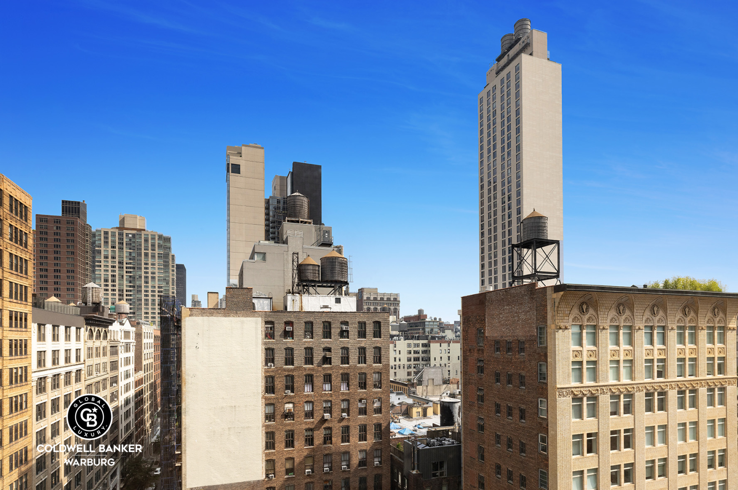 252 7th Avenue, Unit 12I Manhattan, NY 10001 - Photo 12 of 15 a view of a city with tall buildings