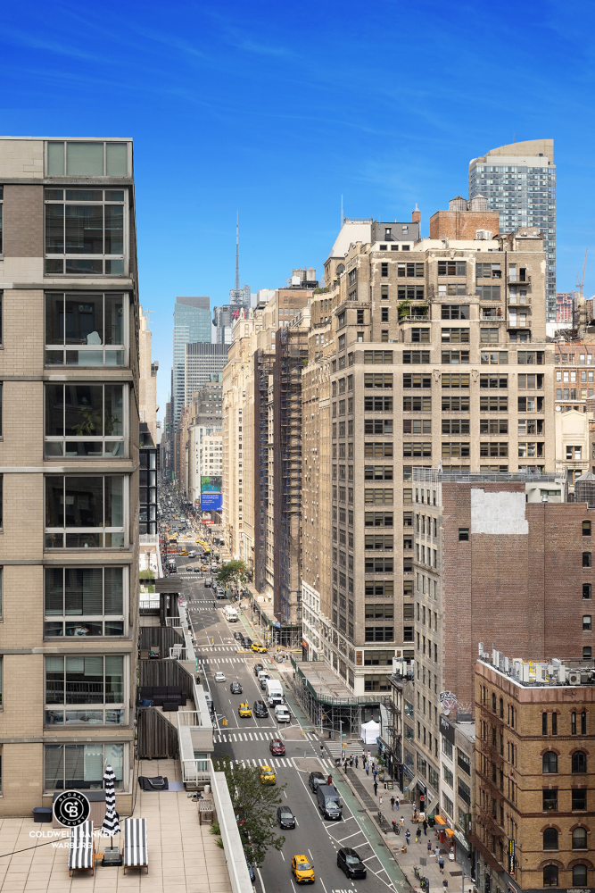 252 7th Avenue, Unit 12I Manhattan, NY 10001 - Photo 13 of 15 a view of a city with tall buildings