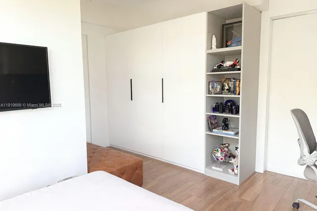 a view of a livingroom with wooden floor
