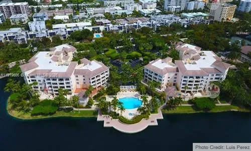a view of a house with a yard and garden