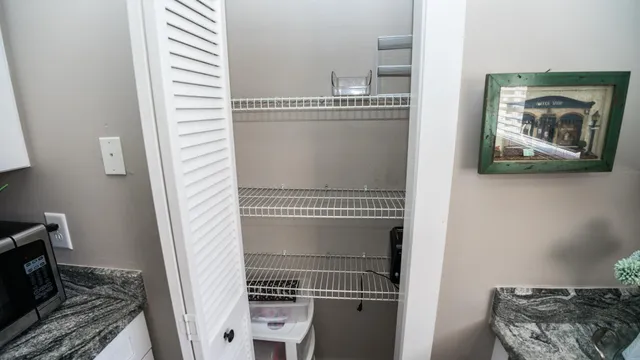 a view of a hallway with workspace