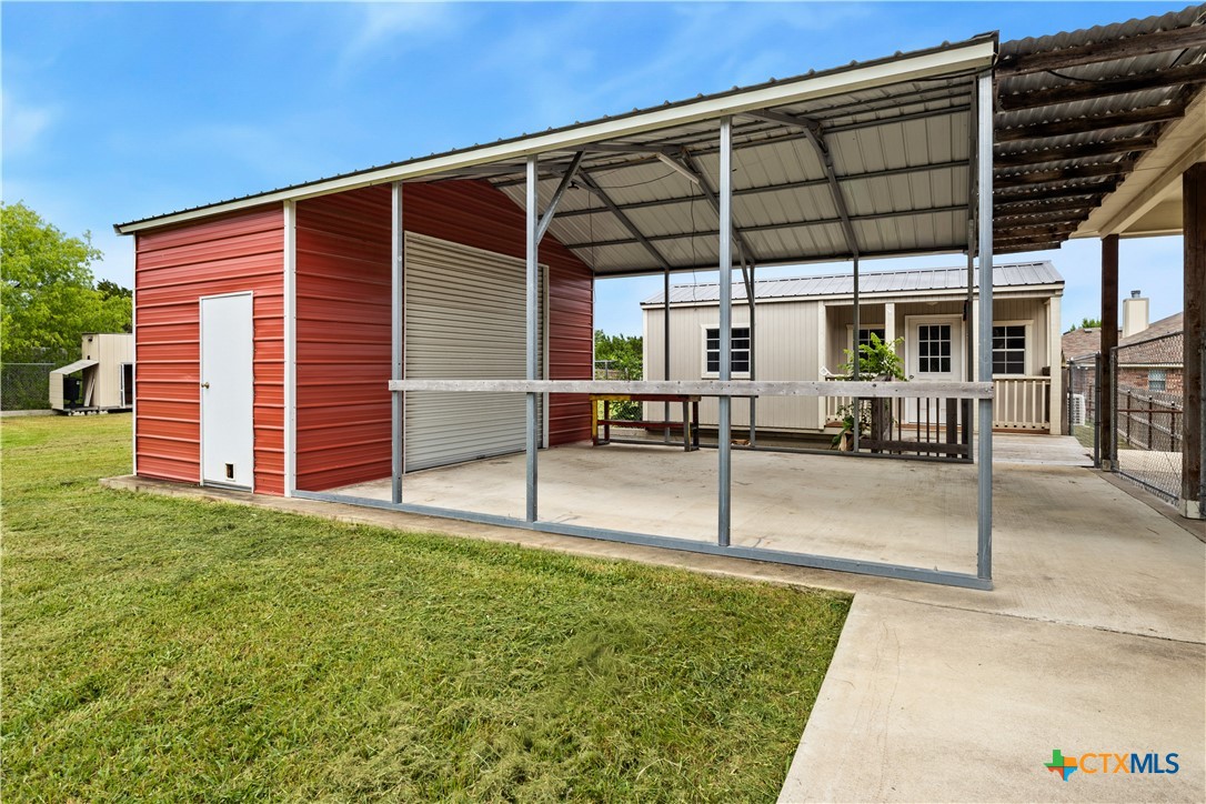 283 County Road 4710 Kempner, TX 76539 - Photo 41 of 47 a patio with a table and chairs