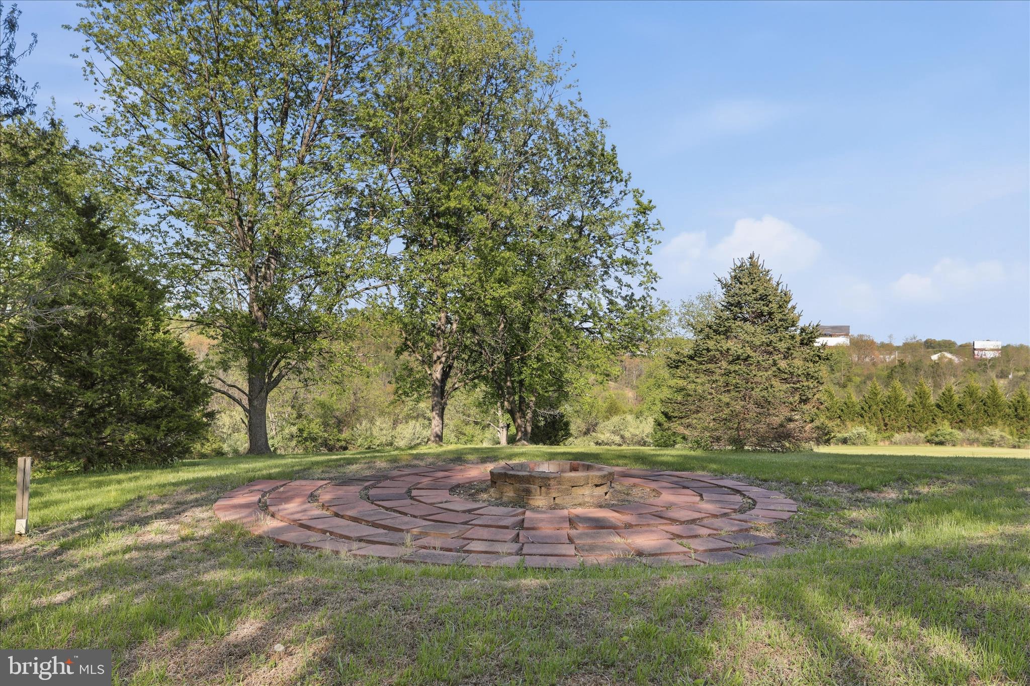 174 Open Field Lane Falling Waters, WV 25419 - Photo 40 of 56 Rear fire pit area