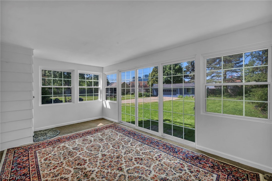 3543 Lytle Road Shaker Heights, OH 44122 - Photo 38 of 49 Bright interior space featuring multiple large windows and glass panel doors
