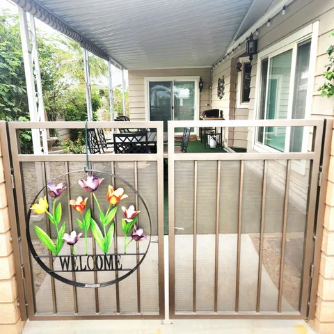 a view of a dining table with chairs in kitchen view