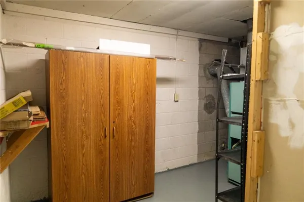 a bathroom with a shower and a sink