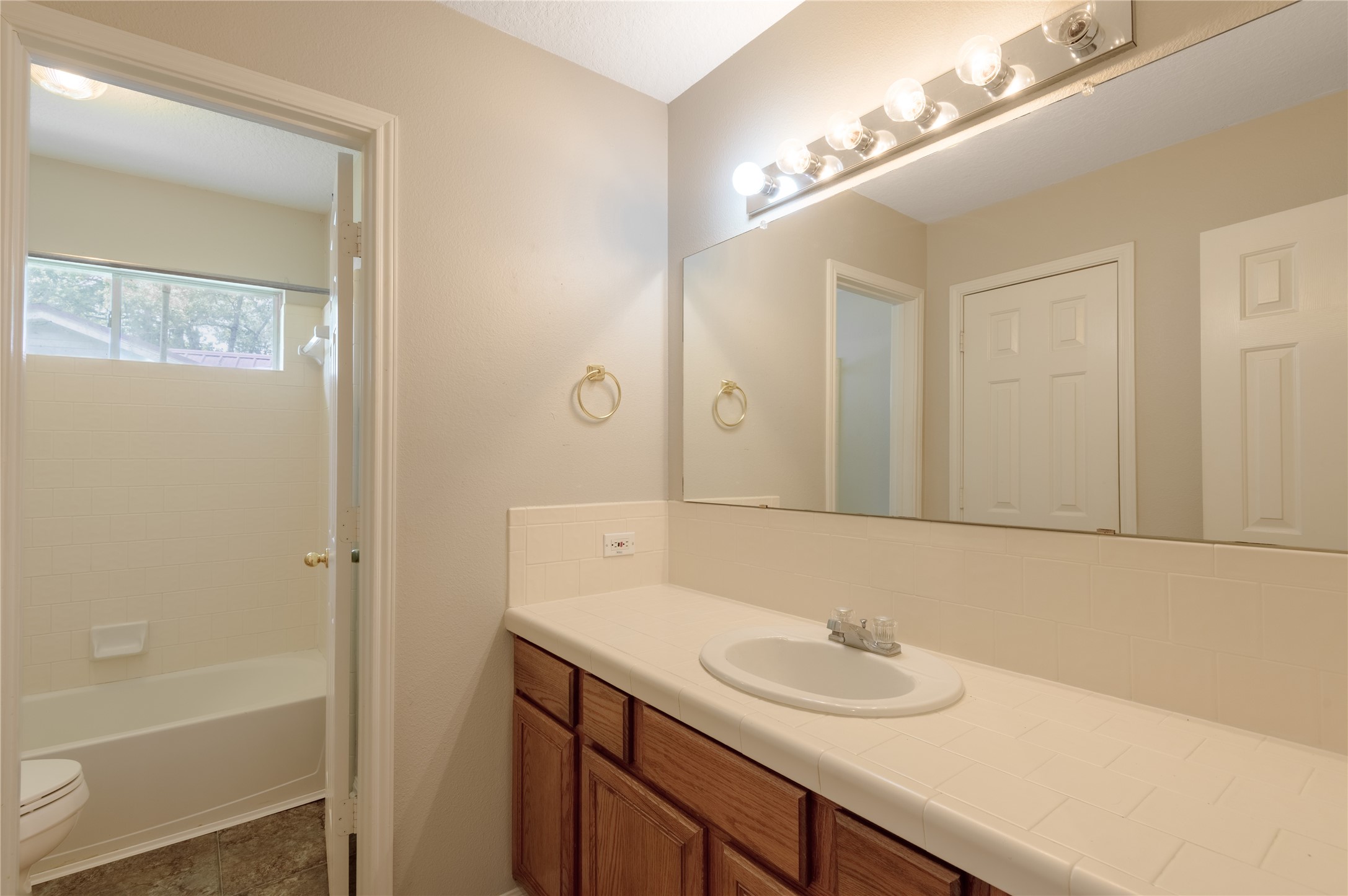 324 Red Oak Lane Trinity, TX 75862 - Photo 33 of 49 a bathroom with a sink and a mirror
