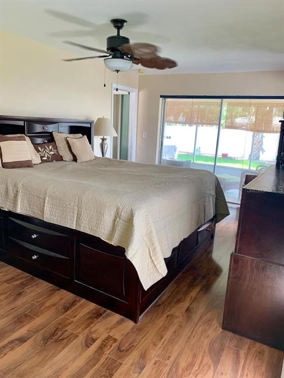 14424 Neptune Road Seminole, FL 33776 - Photo 11 of 32 Master Bedroom with Private Bath & Walk In Closet