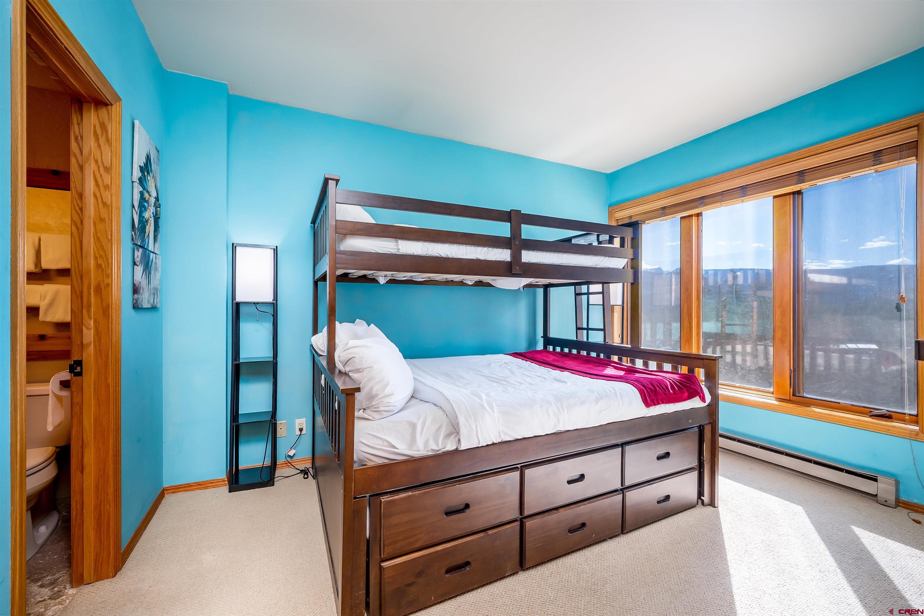71 East Needles Road, Unit 337 Durango, CO 81301 - Photo 17 of 45 a bedroom with a bed and a dresser
