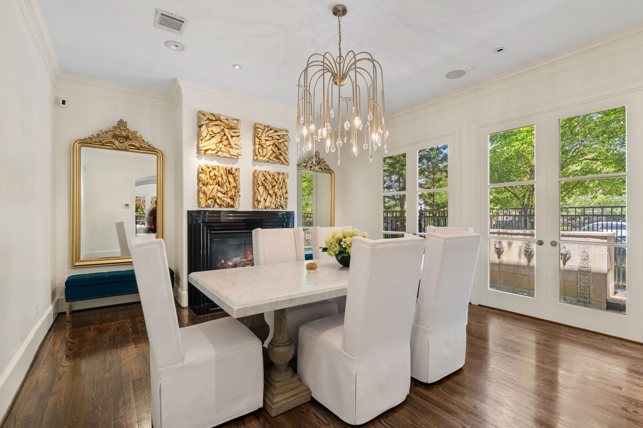 30 Hackberry Lane, Unit A Houston, TX 77027 - Photo 9 of 42 The formal dining room features two sets of fixed, double doors which overlook the pools lionhead water fountains.