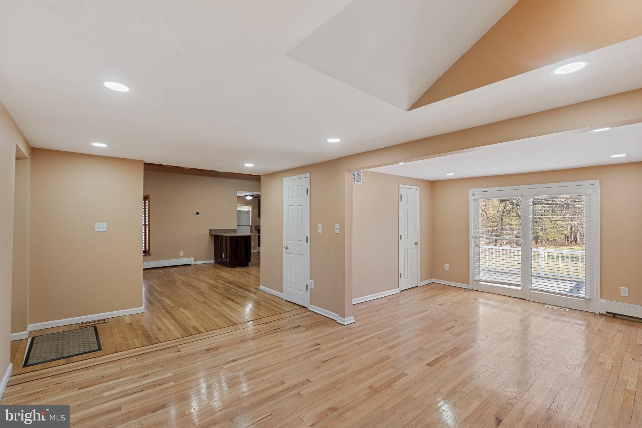 3850 Highway 27 Princeton, NJ 08540 - Photo 16 of 35 a view of an empty room with wooden floor and a window