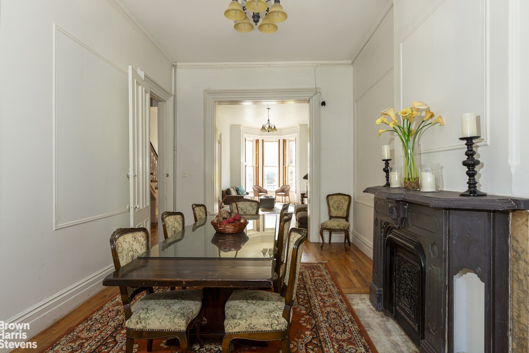 823 Union Street Brooklyn, NY 11215 - Photo 5 of 17 a living room with furniture and a fireplace