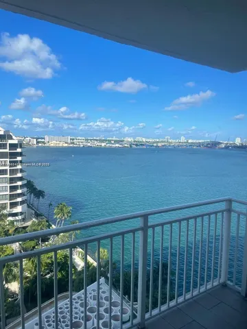 a view of a balcony with an ocean view