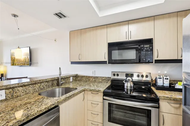 $614,000 | 2951 South Bayshore Drive, Unit 710, Miami, FL 33133