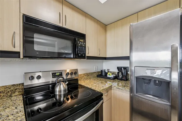 $614,000 | 2951 South Bayshore Drive, Unit 710, Miami, FL 33133