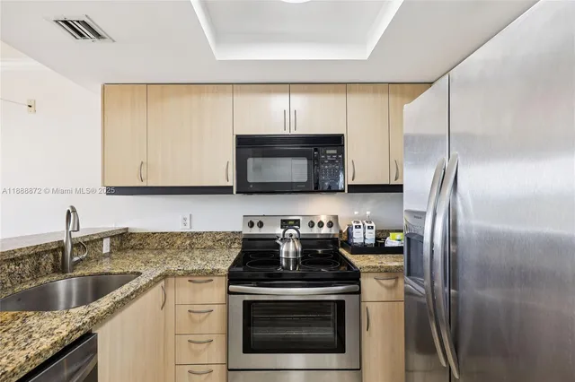 $614,000 | 2951 South Bayshore Drive, Unit 710, Miami, FL 33133