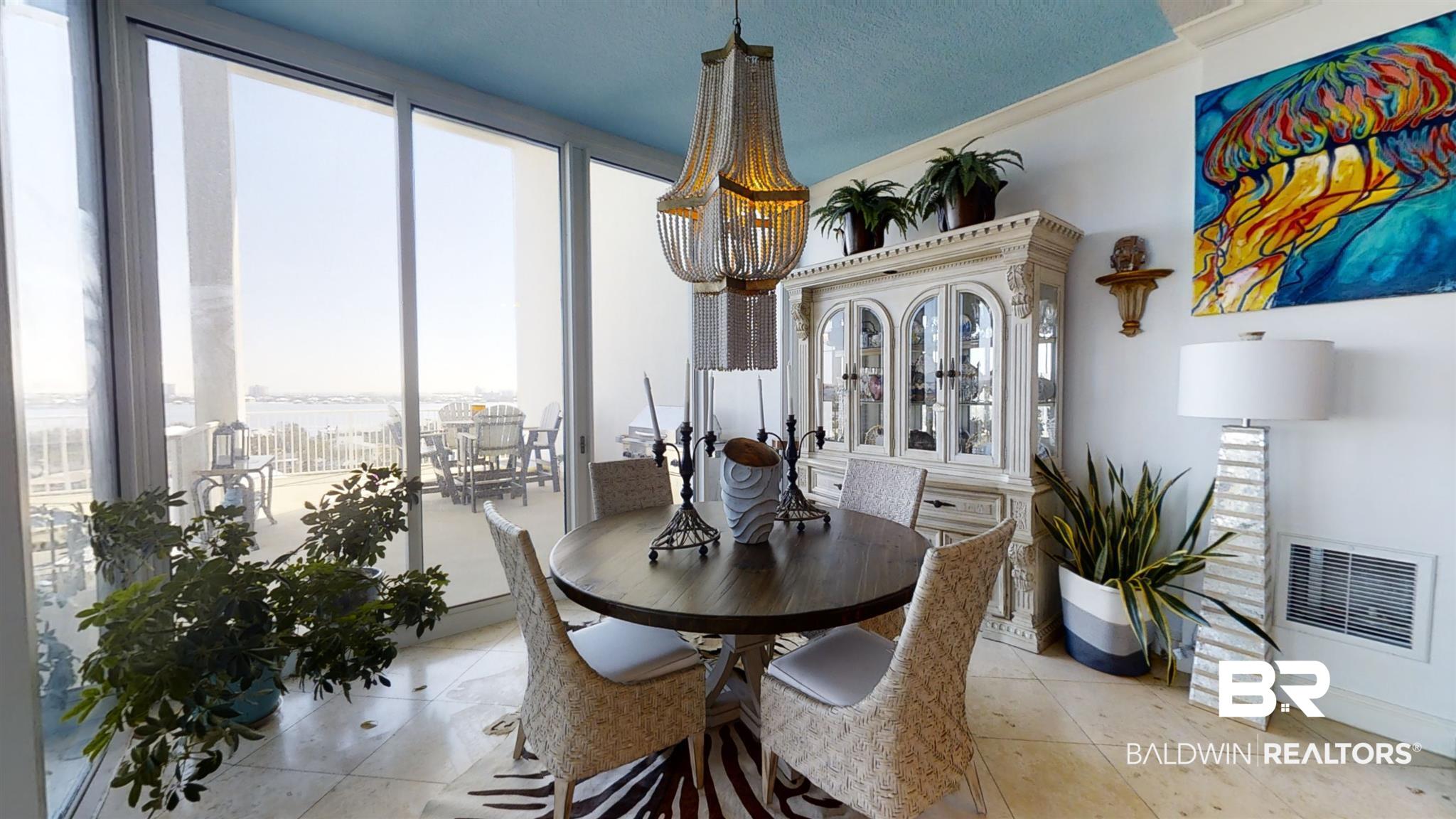 28250 Canal Road, Unit 705 Orange Beach, AL 36561 - Photo 7 of 49 Dining Area: Unit Sold Mostly Furnished