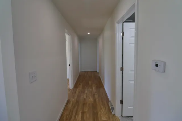 a view of hallway with stairs