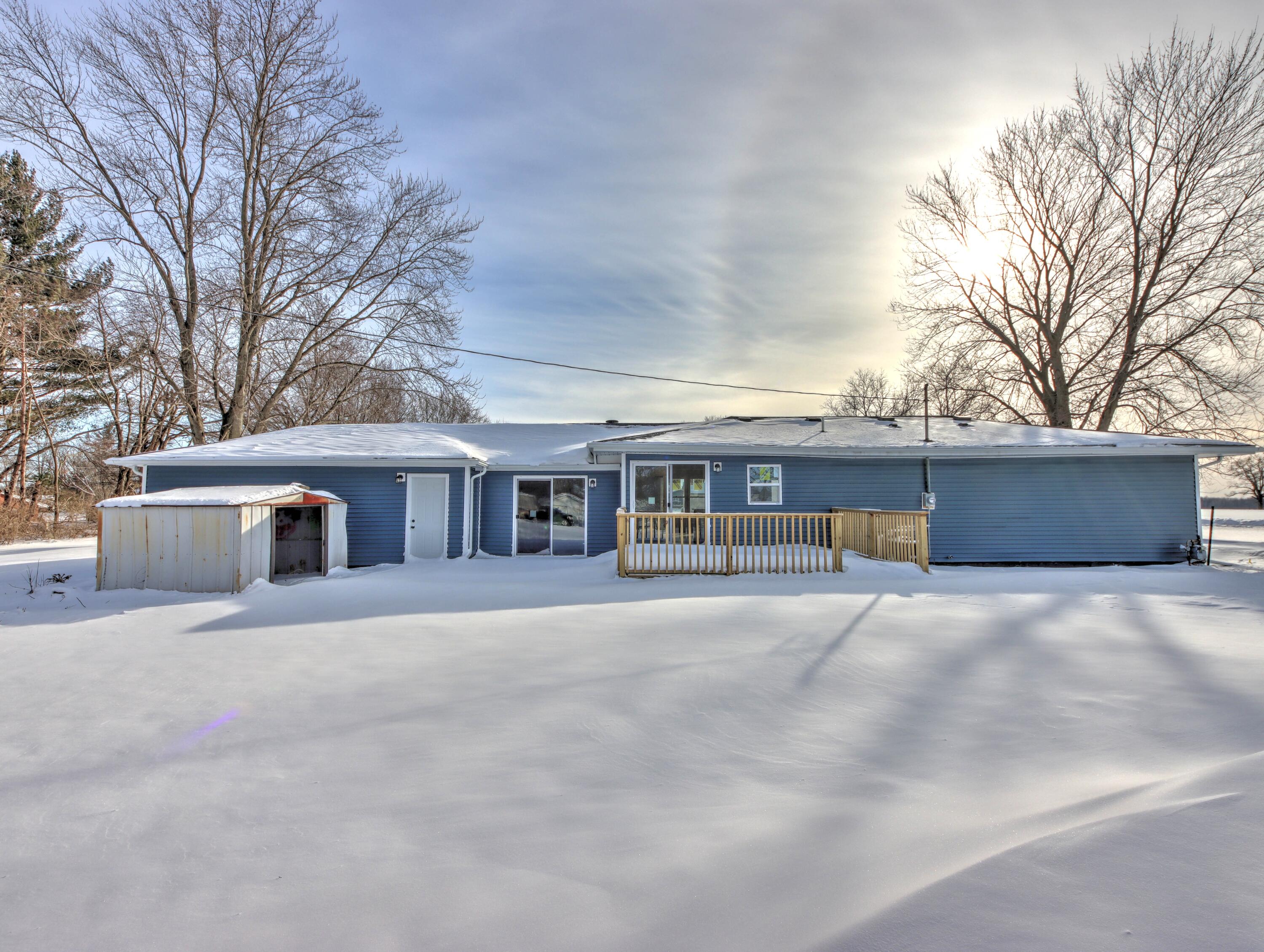 315 Holly Drive Walkerton, IN 46574 - Photo 27 of 33 a front view of house with yard and trees around