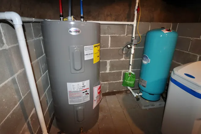 a bathroom with a toilet and a sink