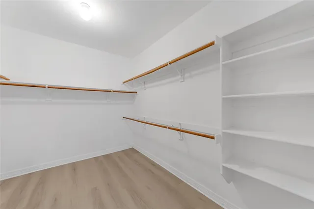 a view of an empty walk in closet