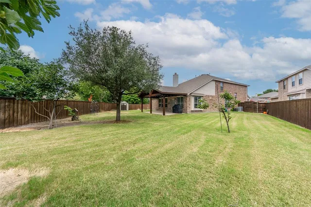 a view of a room with furniture and a garage
