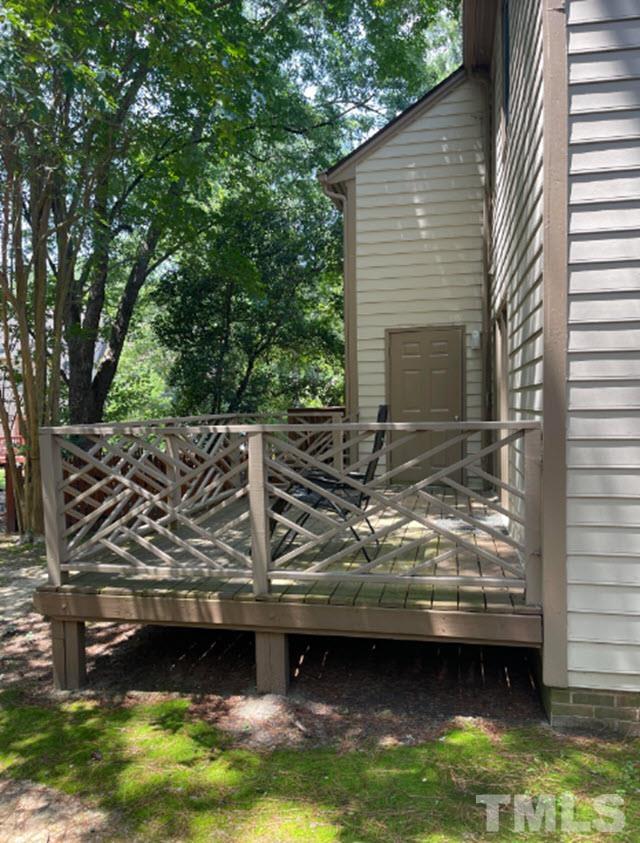 3229 Coachman's Way Durham, NC 27705 - Photo 4 of 10 a view of outdoor space and barbecue grill