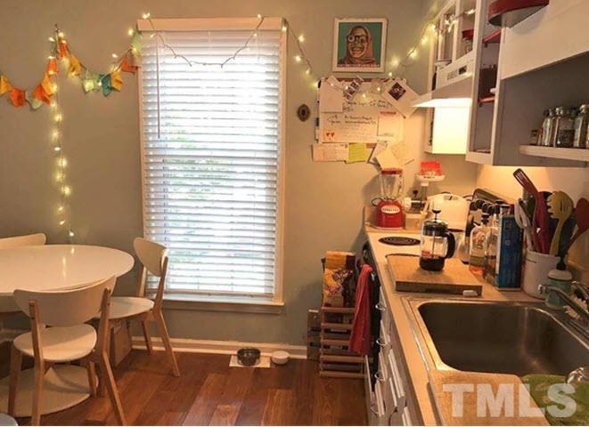 3229 Coachman's Way Durham, NC 27705 - Photo 9 of 10 a bathroom with a sink and a bathtub