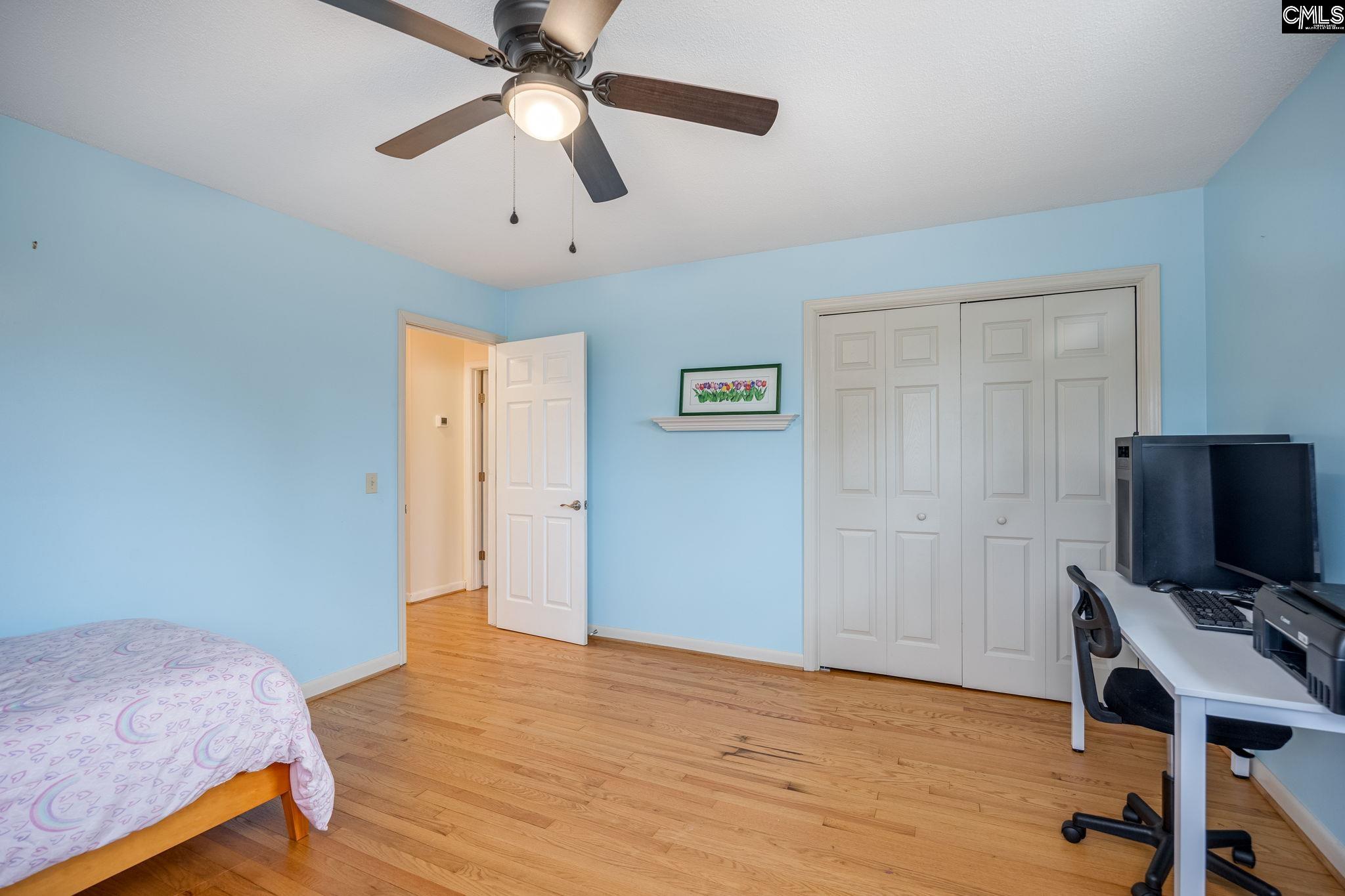 560 Edisto Street Batesburg, SC 29006 - Photo 29 of 49 a bedroom with a bed and a desk