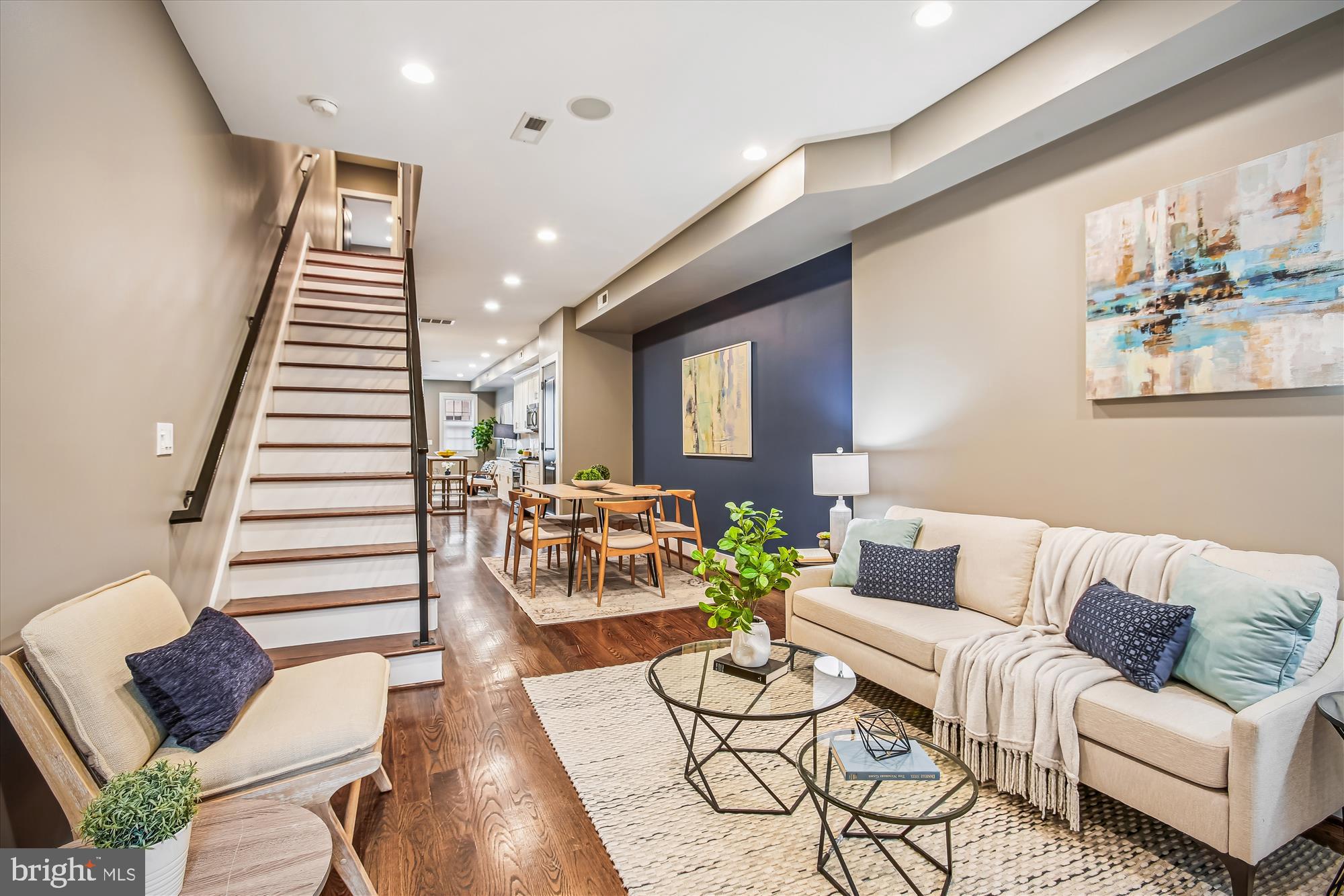 1521 9th Street Northwest Washington, DC 20001 - Photo 1 of 35 a living room with furniture and a wooden floor