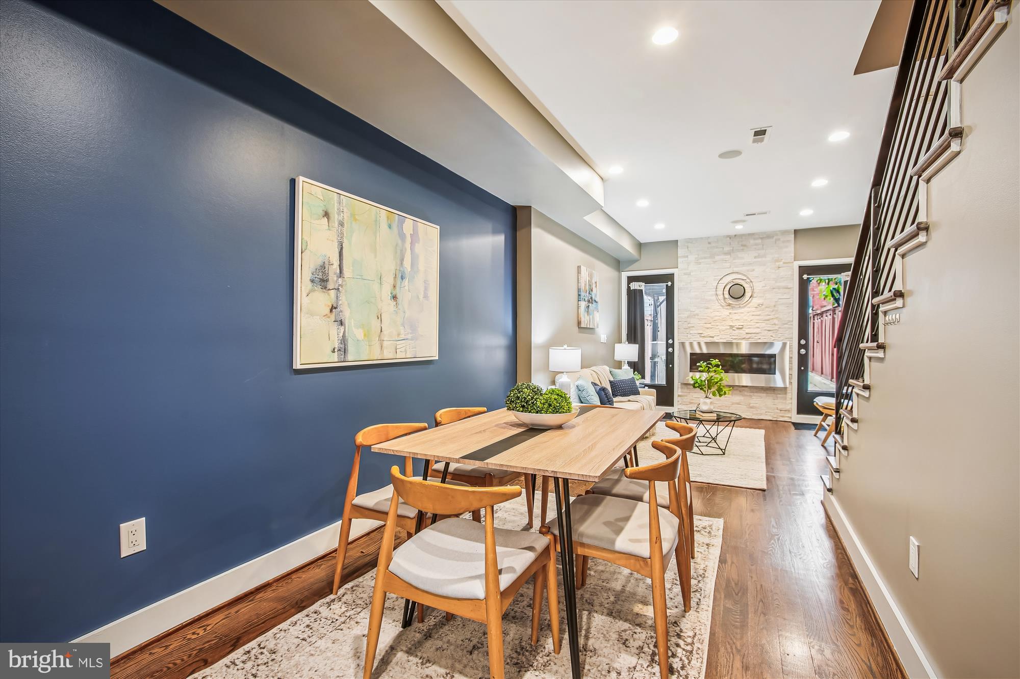 1521 9th Street Northwest Washington, DC 20001 - Photo 11 of 35 a view of a dining room with furniture window and wooden floor