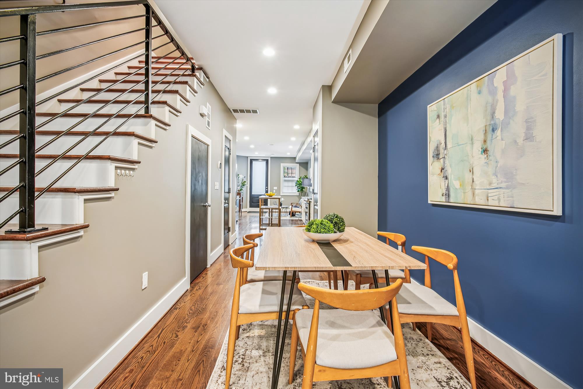 1521 9th Street Northwest Washington, DC 20001 - Photo 12 of 35 a view of a dining room with furniture and wooden floor
