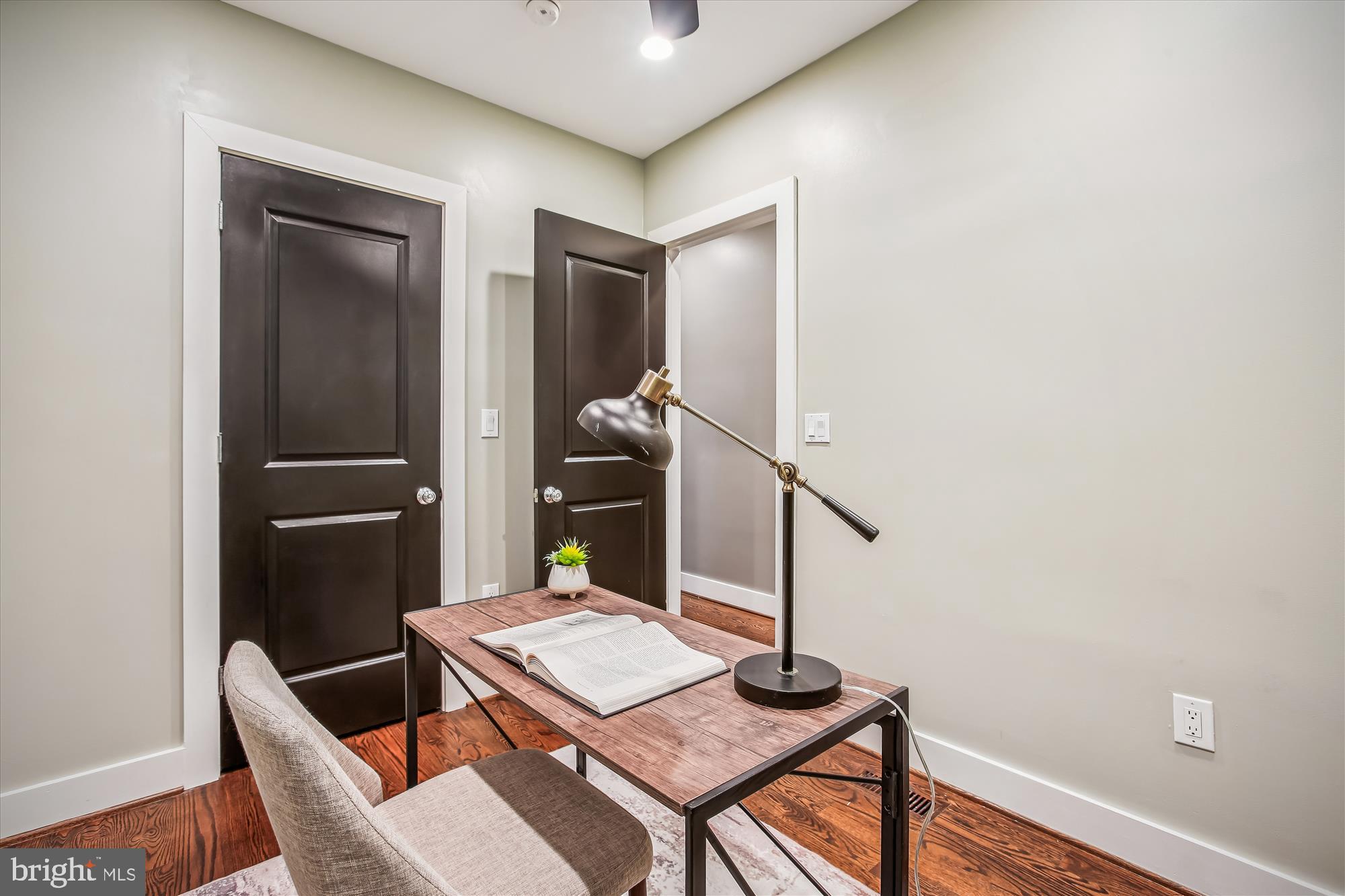 1521 9th Street Northwest Washington, DC 20001 - Photo 28 of 35 a workspace with furniture and wooden floor