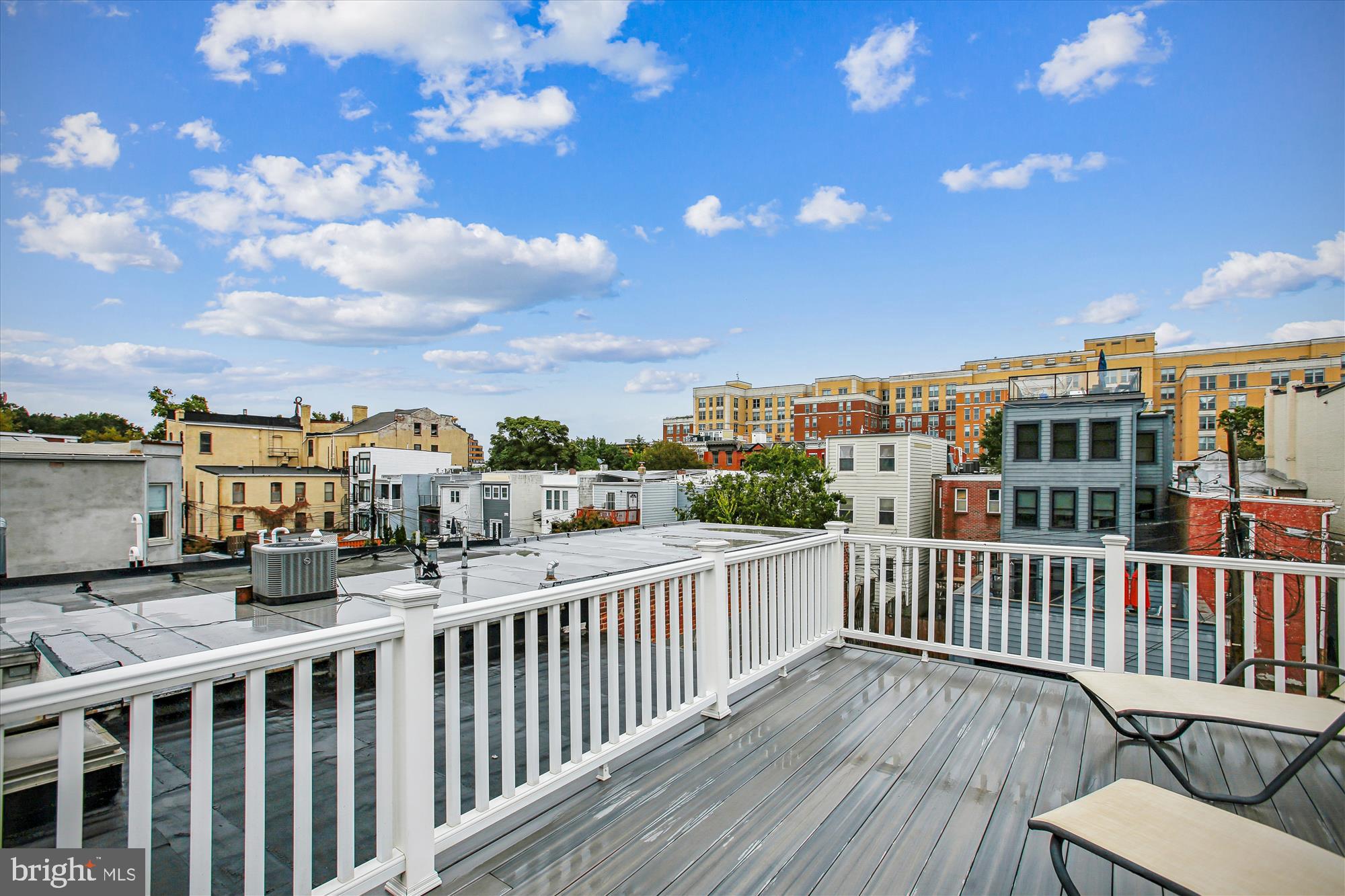 1521 9th Street Northwest Washington, DC 20001 - Photo 32 of 35 a view of a balcony with wooden fence